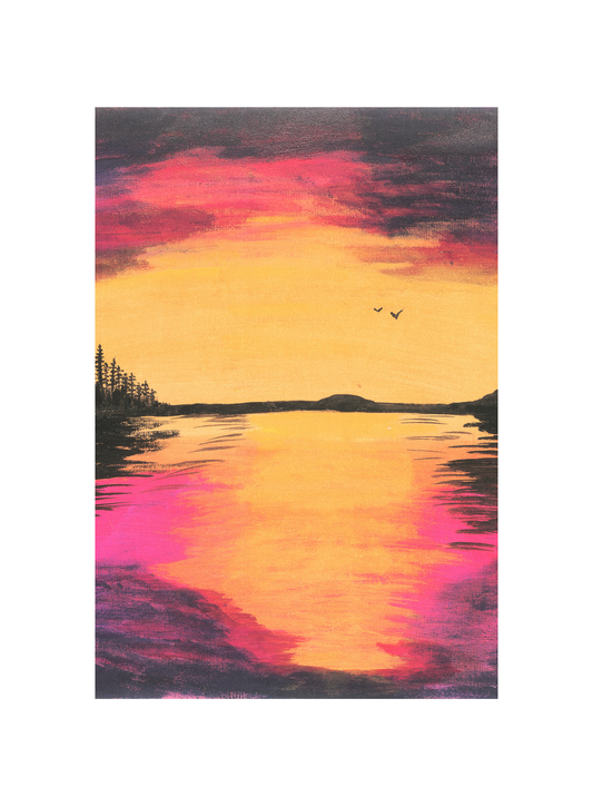 A wall art print featuring a golden sunset over water with a serene landscape.